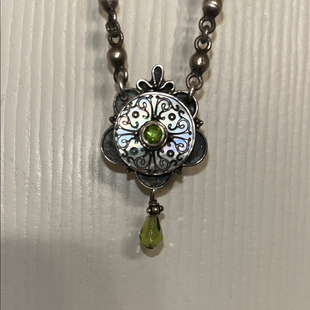 Sterling Silver necklace with Abalone Shell and Peridot crystal